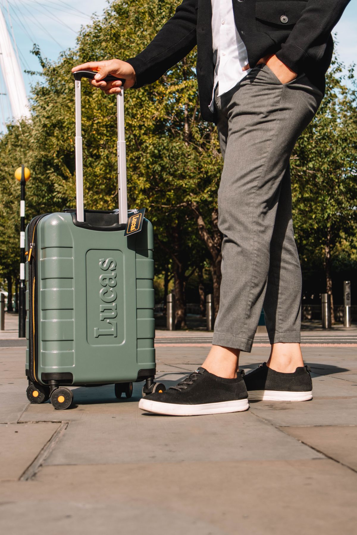 A traveler arriving in a new city with a suitcase